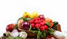 Healthy food. Fresh vegetables and fruits on a wooden table.