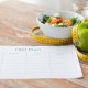 close up of diet plan and food on table