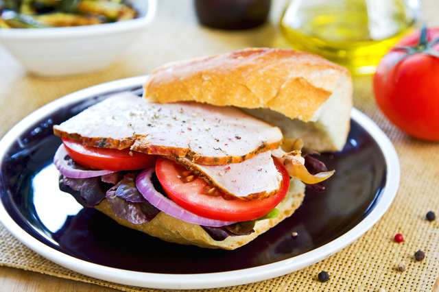 Ham on baguette sandwich by fresh ingredients