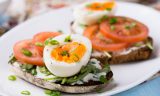 Rye toast sandwiches with egg, tomato and soft cheese