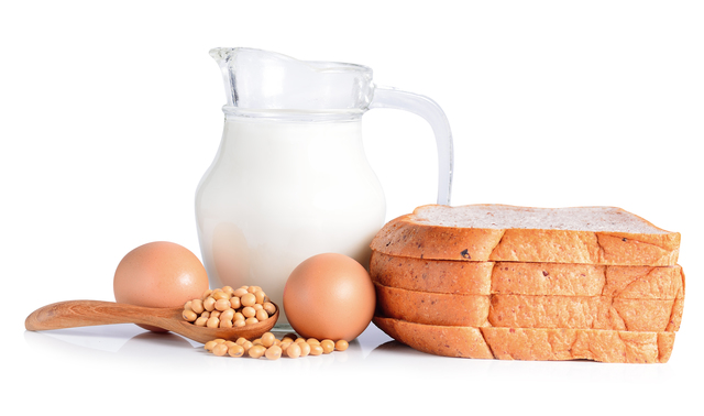 eggs ,soybeans ,milk and bread on white background.