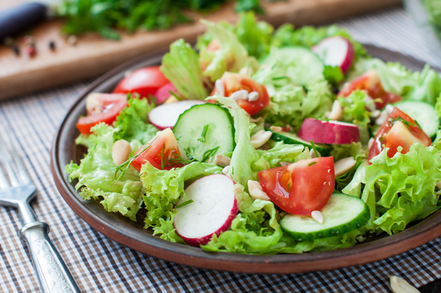 Tomato and cucumber salad with lettuce