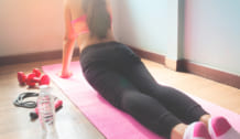 Young woman in pink sport bra doing yoga, Healthy lifestyle