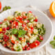 Tabbouleh salad with tomato, cucumber, couscous, mint and pomegr