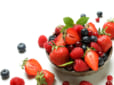 Delicious fresh berry mix on white background