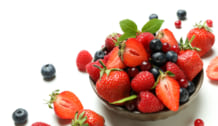 Delicious fresh berry mix on white background